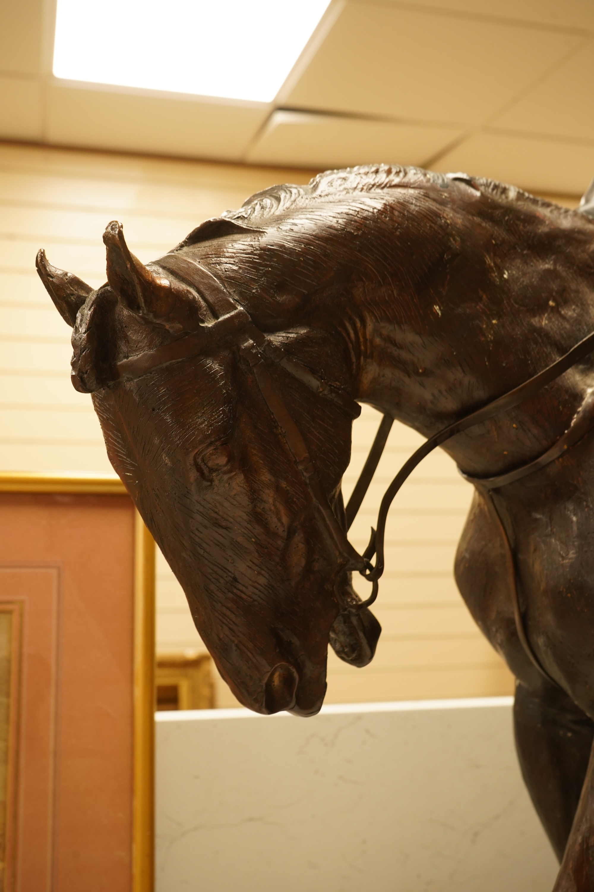 After Isidore Jules Bonheur (1827-1901), a large bronze figure of a jockey on horseback, 90cm tall
